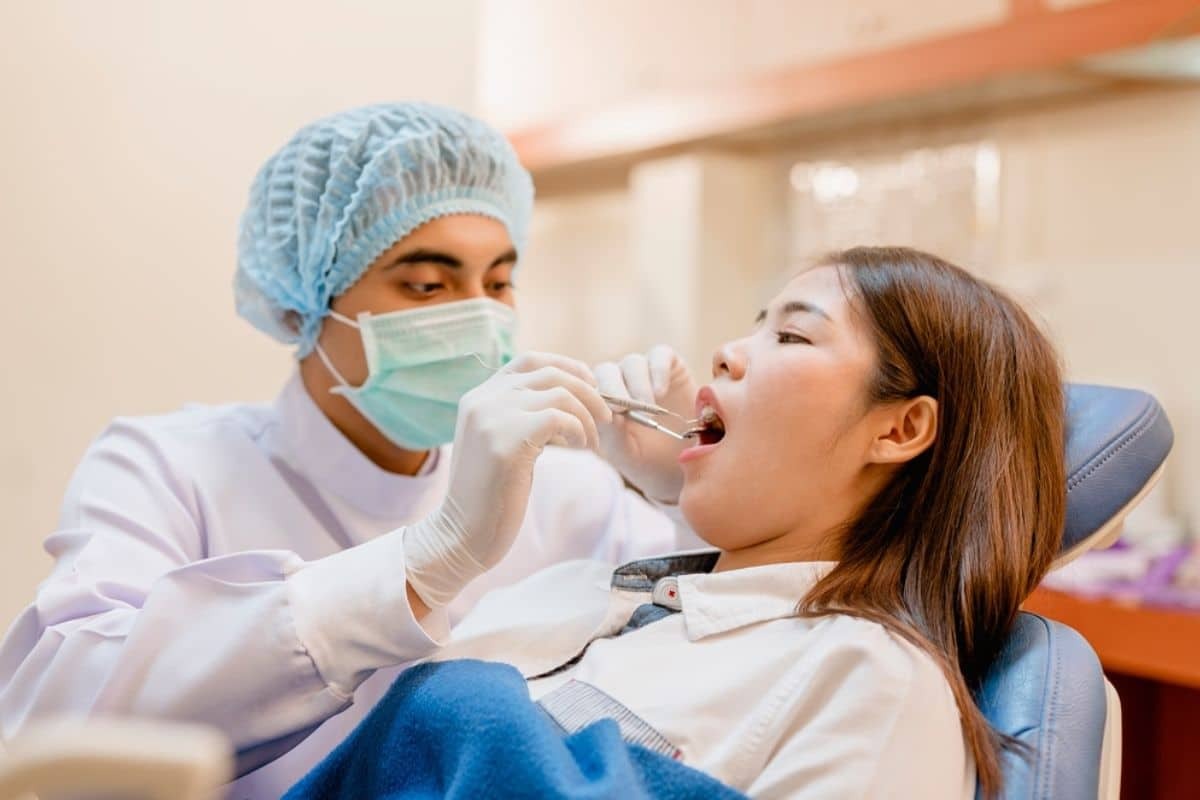 Young Girl at orthodontic office during early phase treatment.